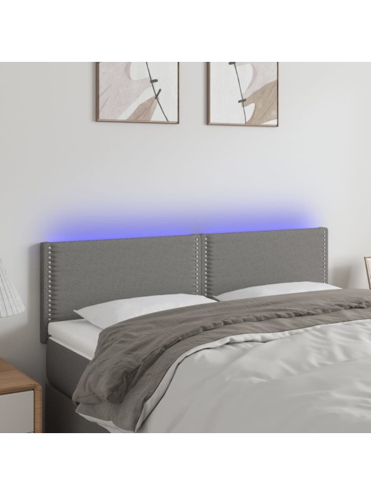 Čelo postele s LED tmavě šedé 144x5x78/88 cm textil