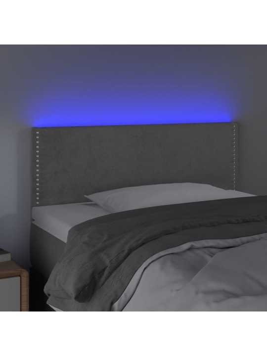 Čelo postele s LED světle šedé 90x5x78/88 cm samet