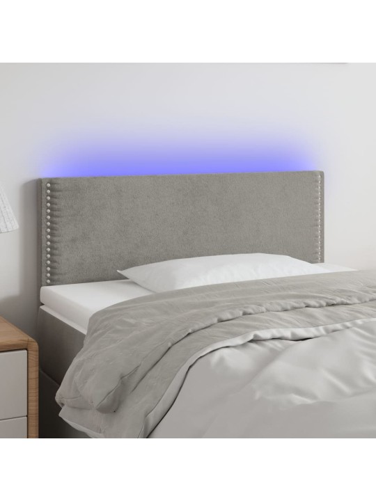 Čelo postele s LED světle šedé 90x5x78/88 cm samet