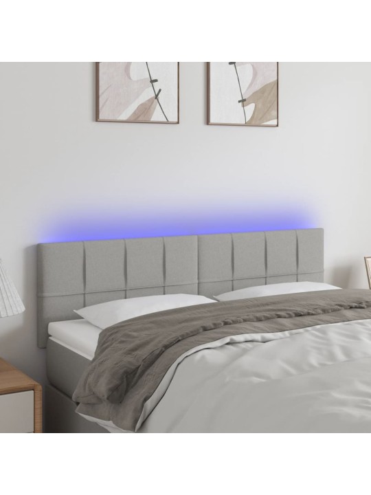 Čelo postele s LED světle šedé 144 x 5 x 78/88 cm textil