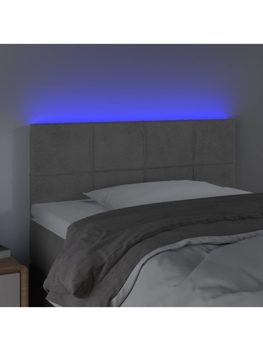 Čelo postele s LED světle šedé 90x5x78/88 cm samet