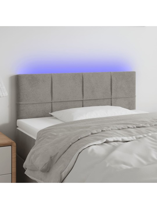 Čelo postele s LED světle šedé 90x5x78/88 cm samet
