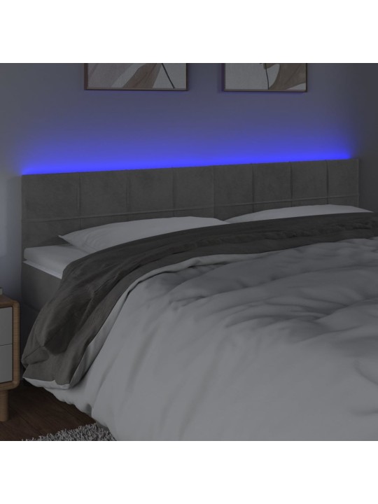 Čelo postele s LED světle šedé 160x5x78/88 cm samet