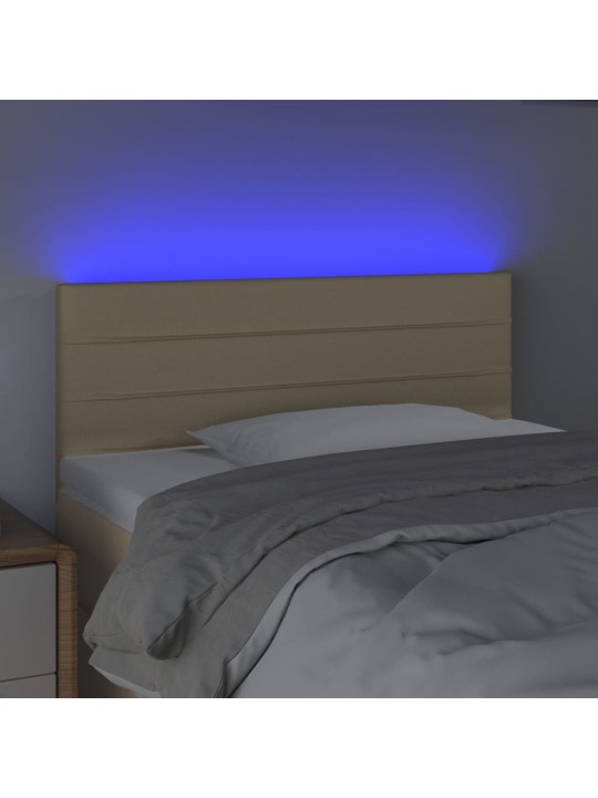 Čelo postele s LED krémové 100x5x78/88 cm textil
