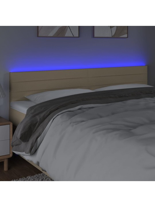 Čelo postele s LED krémové 200x5x78/88 cm textil