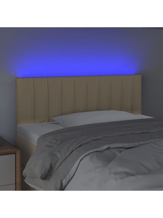 Čelo postele s LED krémové 100x5x78/88 cm textil