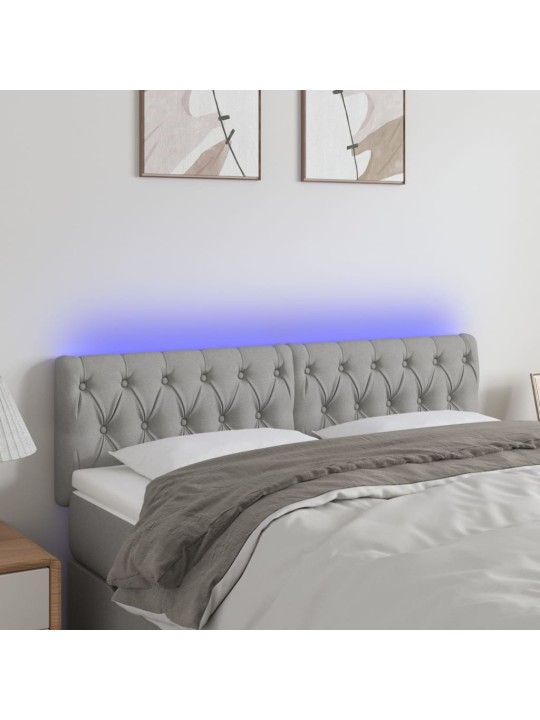 Čelo postele s LED světle šedé 144 x 7 x 78/88 cm textil