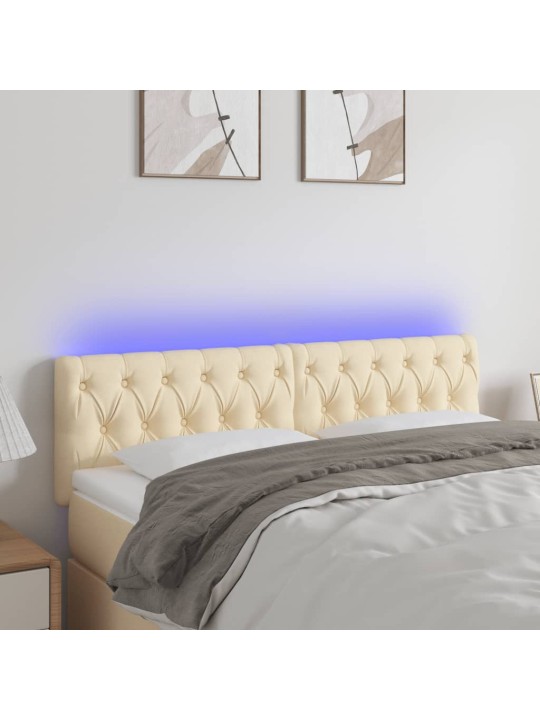 Čelo postele s LED krémové 144 x 7 x 78/88 cm textil