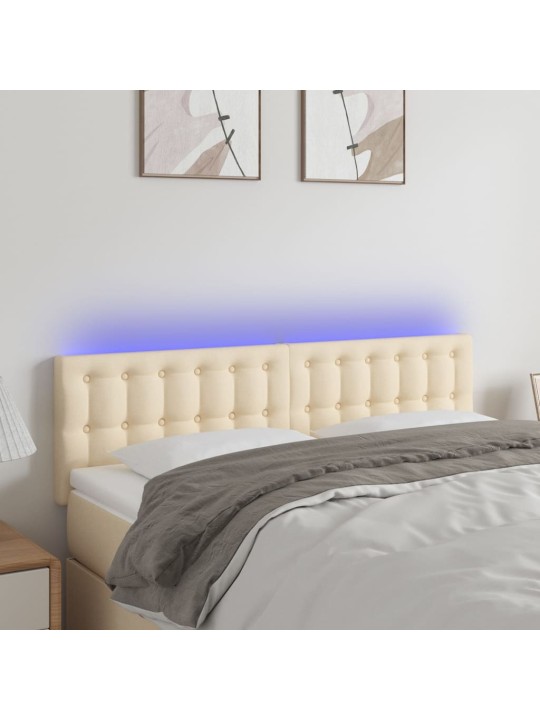 Čelo postele s LED krémové 144x5x78/88 cm textil