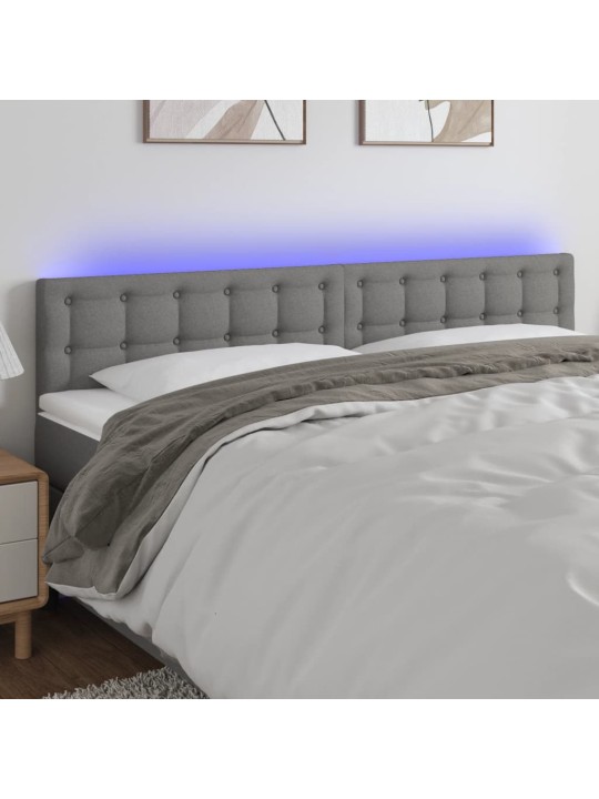 Čelo postele s LED tmavě šedé 160x5x78/88 cm textil