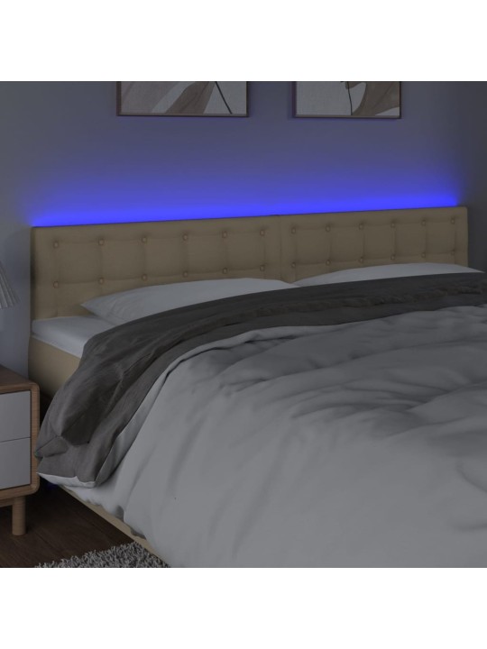 Čelo postele s led krémové 160x5x78/88 cm textil