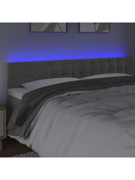 Čelo postele s LED světle šedé 160x5x78/88 cm samet