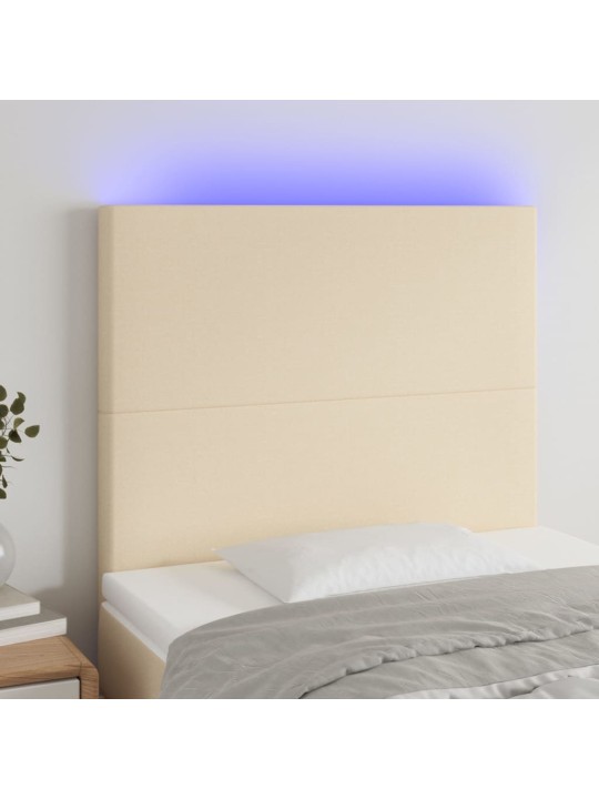 Čelo postele s LED krémové 100x5x118/128 cm textil