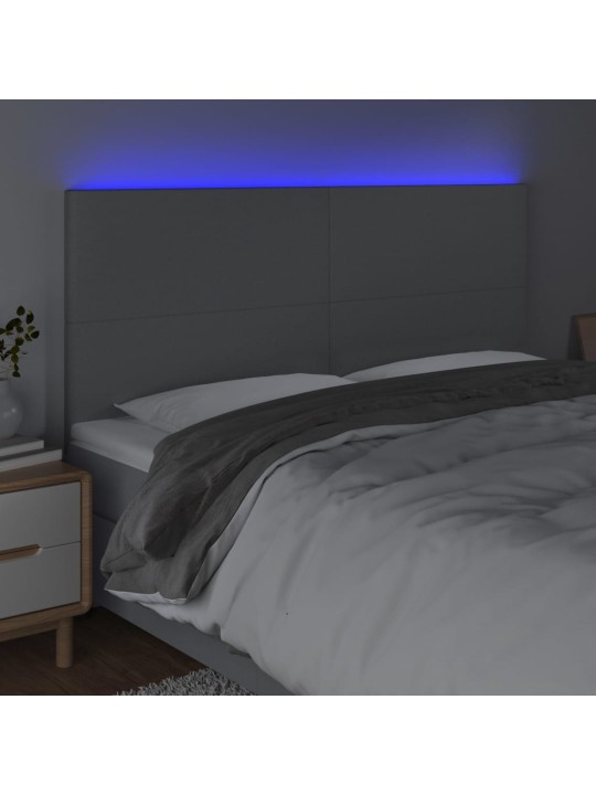 Čelo postele s LED světle šedé 160x5x118/128 cm textil