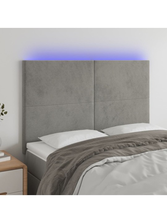Čelo postele s LED světle šedé 144x5x118/128 cm samet