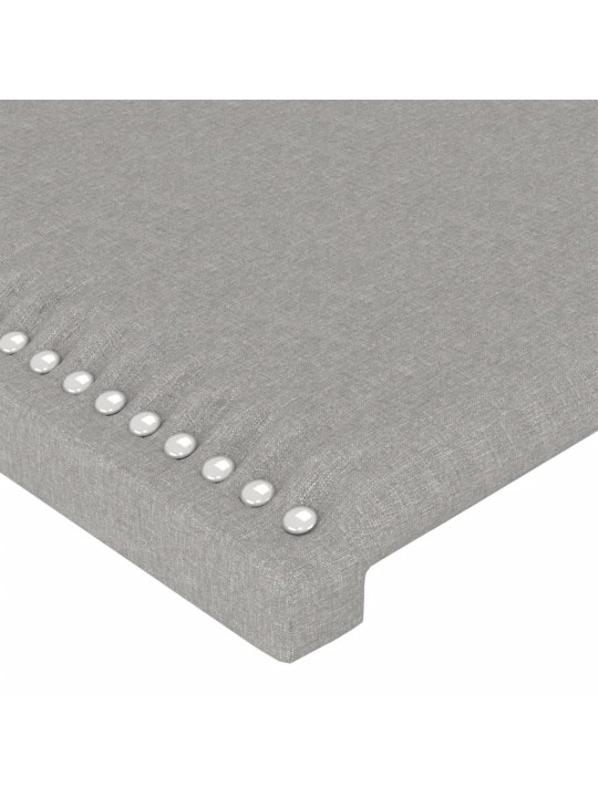 Čelo postele s LED světle šedé 100x5x118/128 cm textil