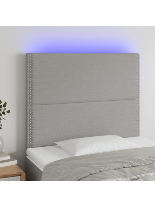 Čelo postele s LED světle šedé 100x5x118/128 cm textil