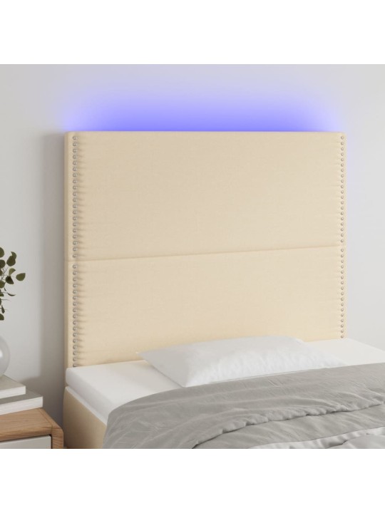 Čelo postele s LED krémové 100x5x118/128 cm textil