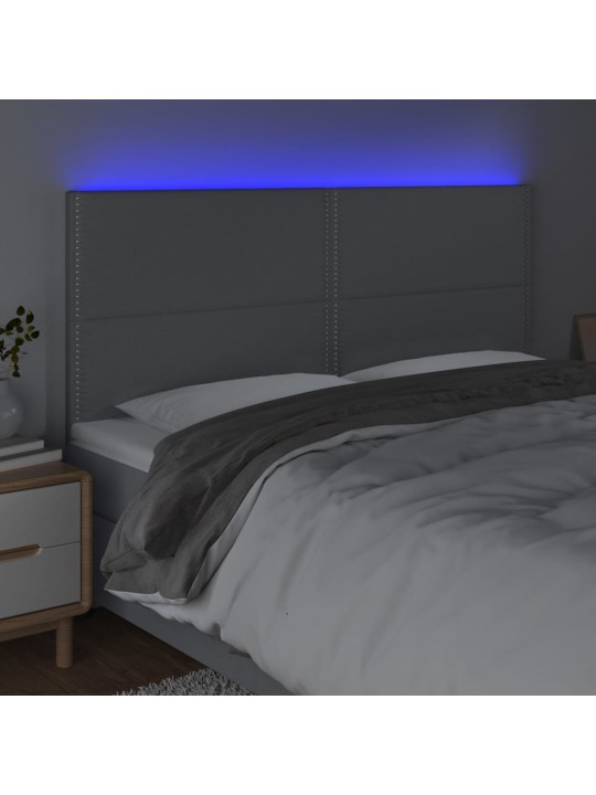 Čelo postele s LED světle šedé 160x5x118/128 cm textil