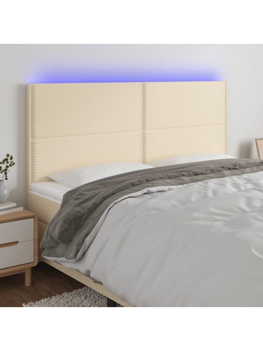Čelo postele s LED krémová 200x5x118/128 cm textil
