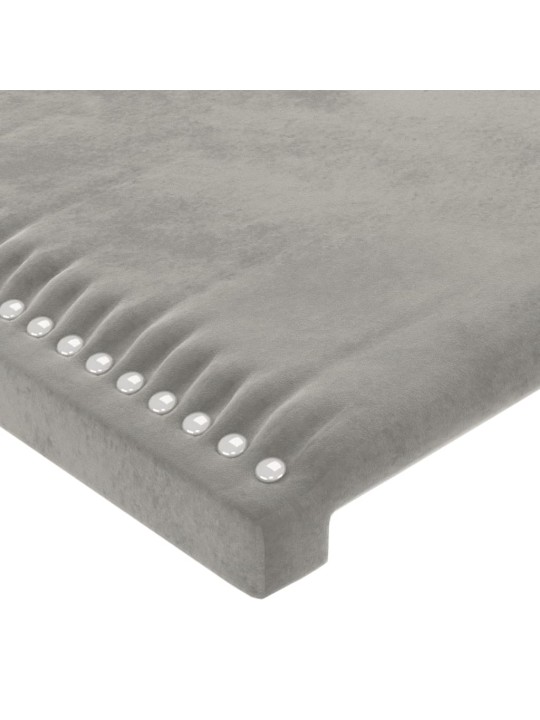 Čelo postele s LED světle šedé 144x5x118/128 cm samet