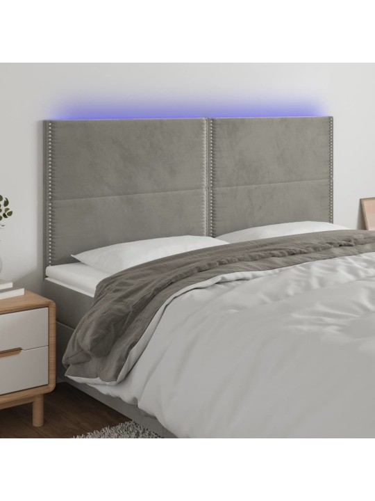 Čelo postele s LED světle šedé 160x5x118/128 cm samet