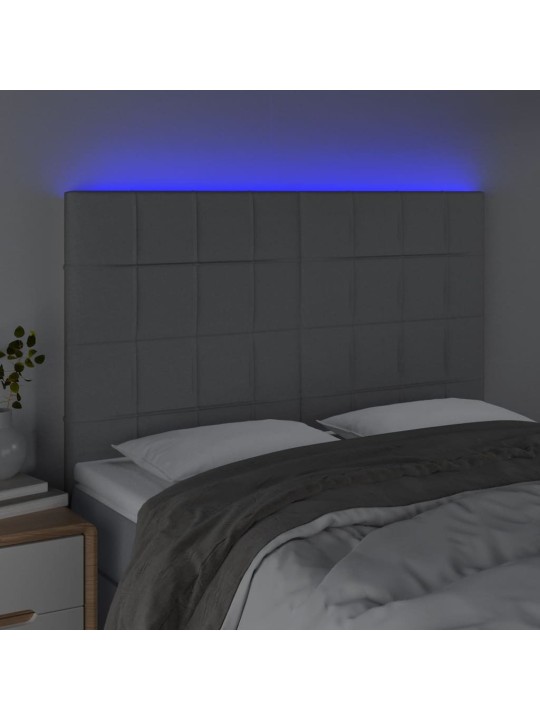 Čelo postele s LED světle šedé 144x5x118/128 cm textil