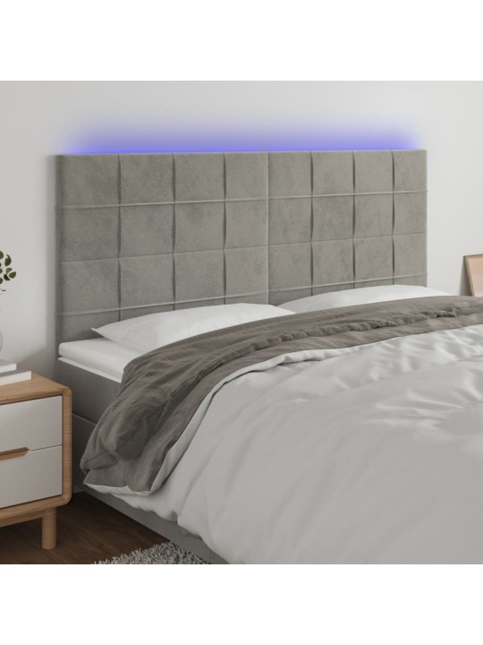 Čelo postele s LED světle šedé 160x5x118/128 cm samet