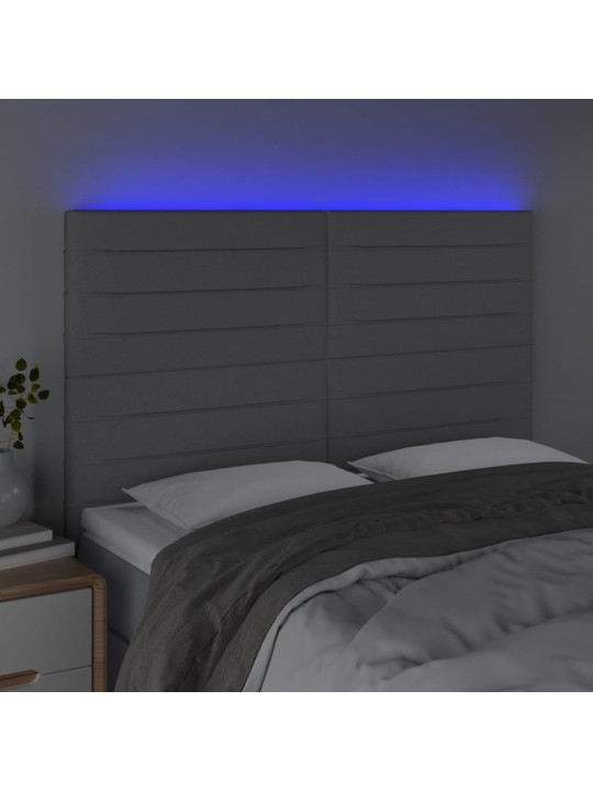 Čelo postele s LED světle šedé 144x5x118/128 cm textil