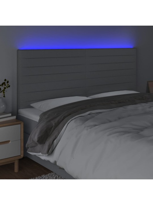 Čelo postele s LED světle šedé 160x5x118/128 cm textil