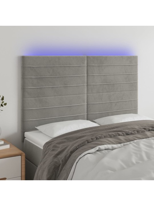 Čelo postele s LED světle šedé 144x5x118/128 cm samet
