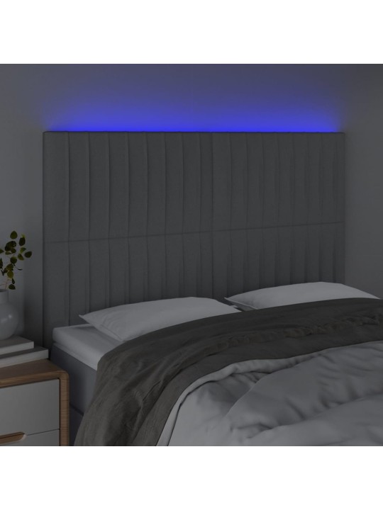 Čelo postele s LED světle šedé 144x5x118/128 cm textil