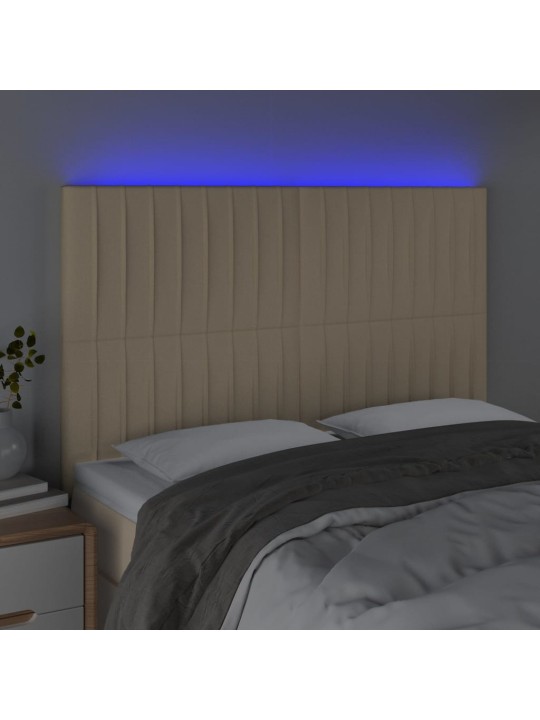 Čelo postele s led krémové 144x5x118/128 cm textil