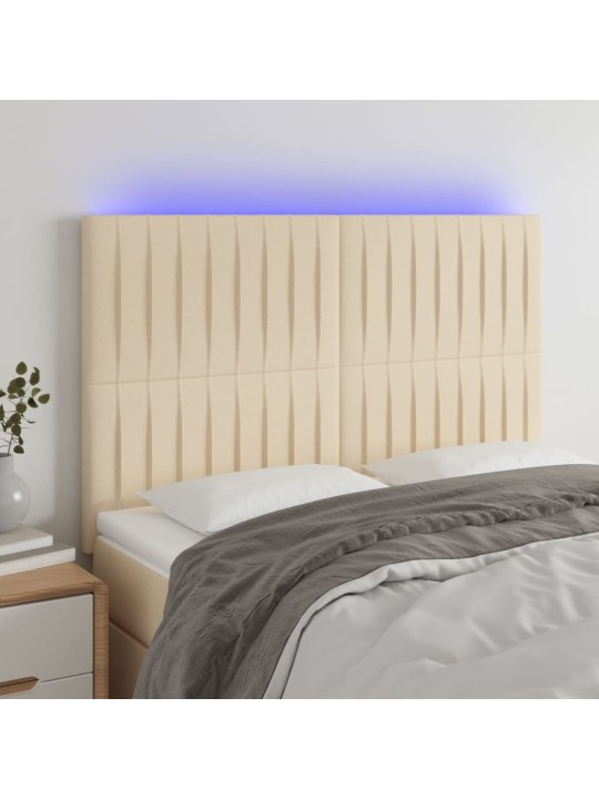 Čelo postele s led krémové 144x5x118/128 cm textil
