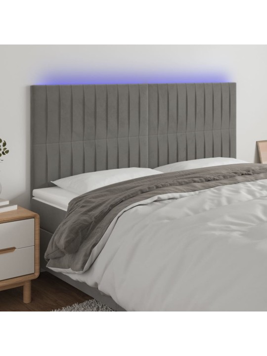 Čelo postele s LED světle šedé 160x5x118/128 cm samet