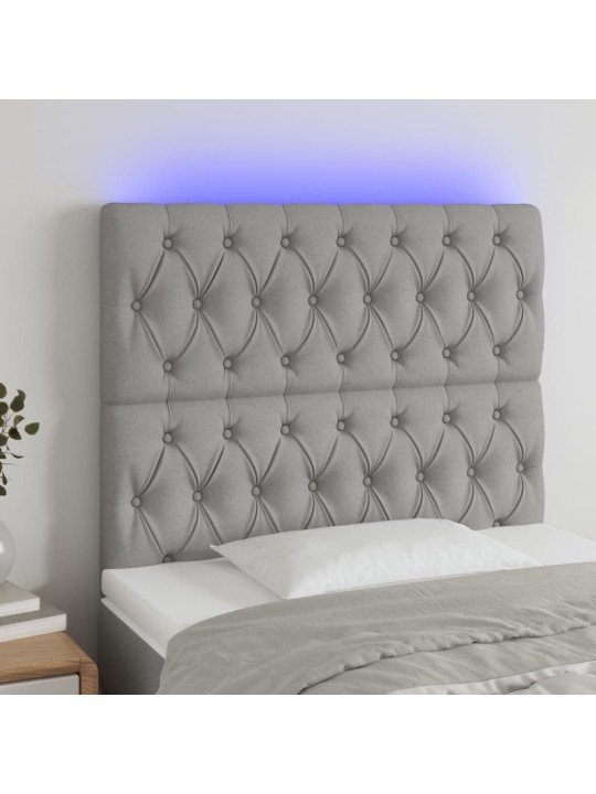 Čelo postele s LED světle šedé 100x7x118/128 cm textil