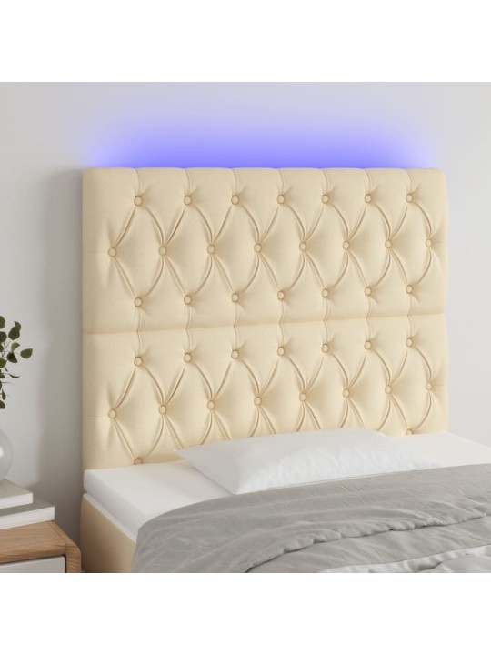 Čelo postele s LED krémová 100x7x118/128 cm textil