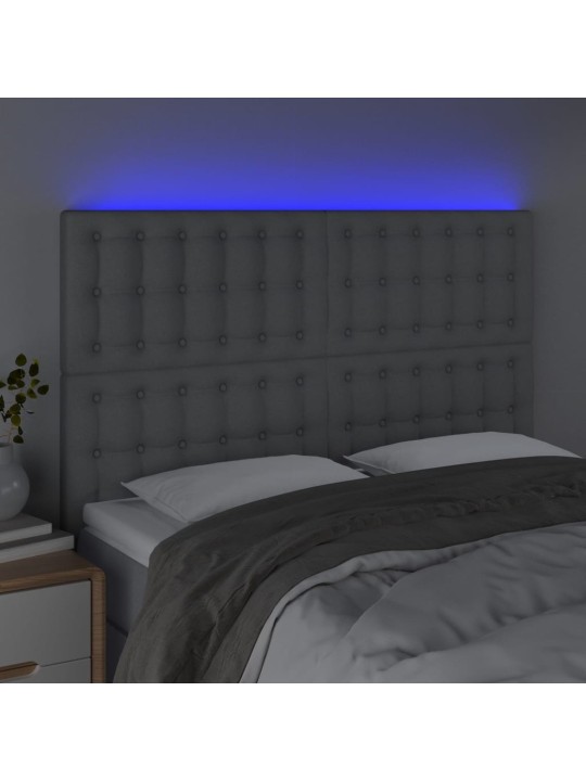 Čelo postele s LED světle šedé 144x5x118/128 cm textil