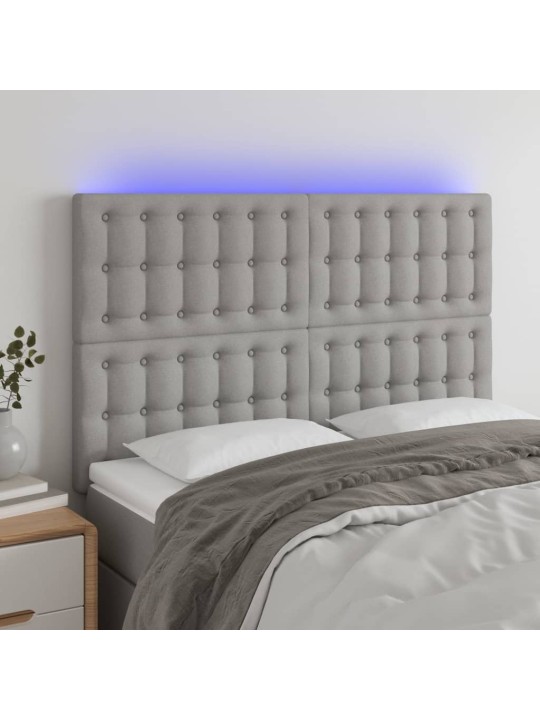 Čelo postele s LED světle šedé 144x5x118/128 cm textil