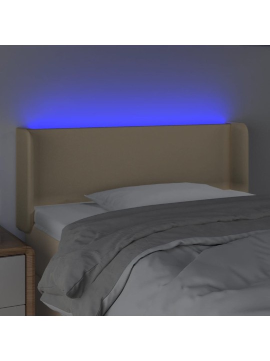 Čelo postele s LED krémové 83 x 16 x 78/88 cm textil