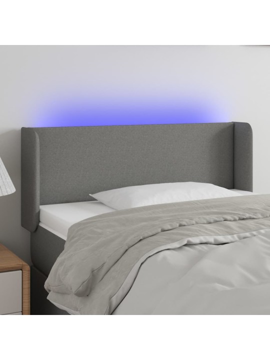 Čelo postele s LED tmavě šedé 103 x 16 x 78/88 cm textil