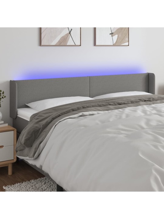 Čelo postele s LED tmavě šedé 163 x 16 x 78/88 cm textil