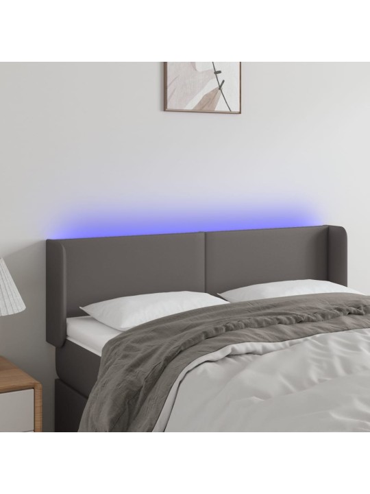Čelo postele s led šedé 147 x 16 x 78/88 cm umělá kůže