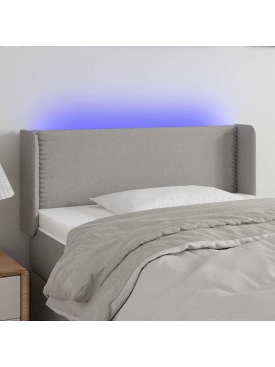 Čelo postele s LED světle šedé 93 x 16 x 78/88 cm textil