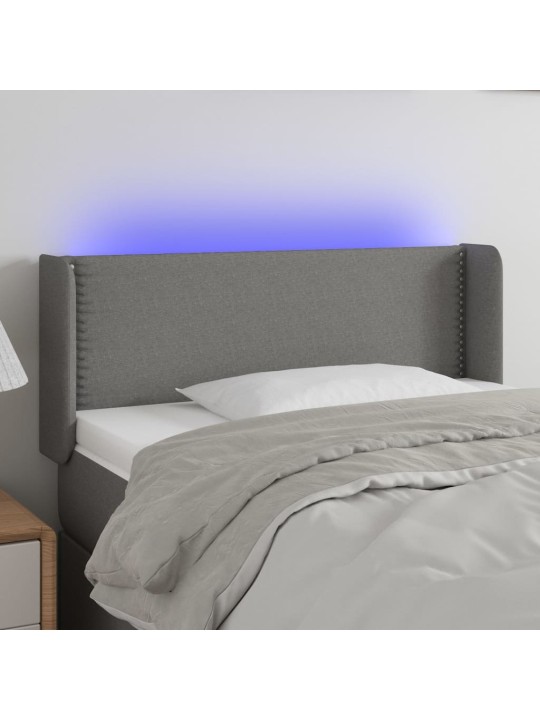 Čelo postele s LED tmavě šedé 103 x 16 x 78/88 cm textil