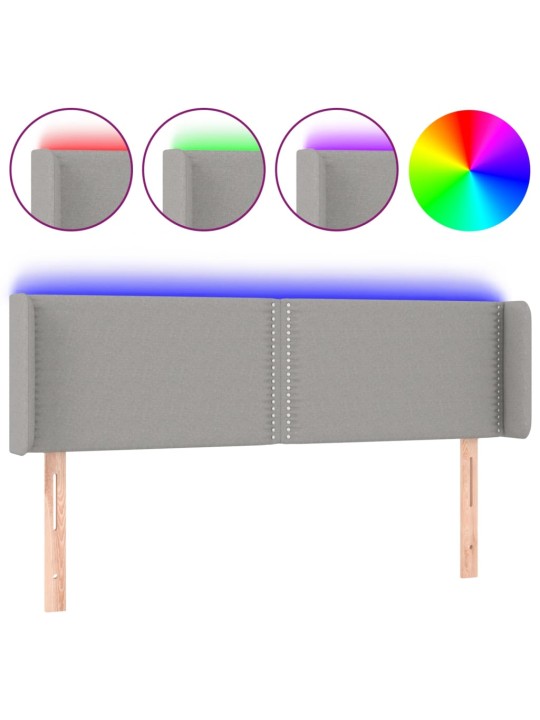 Čelo postele s LED světle šedé 147 x 16 x 78/88 cm textil