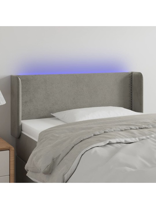 Čelo postele s LED světle šedé 93 x 16 x 78/88 cm samet