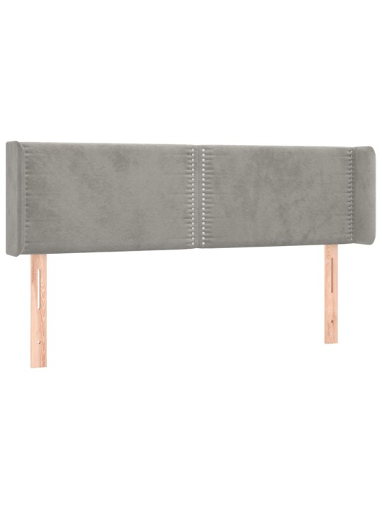 Čelo postele s LED světle šedé 147 x 16 x 78/88 cm samet