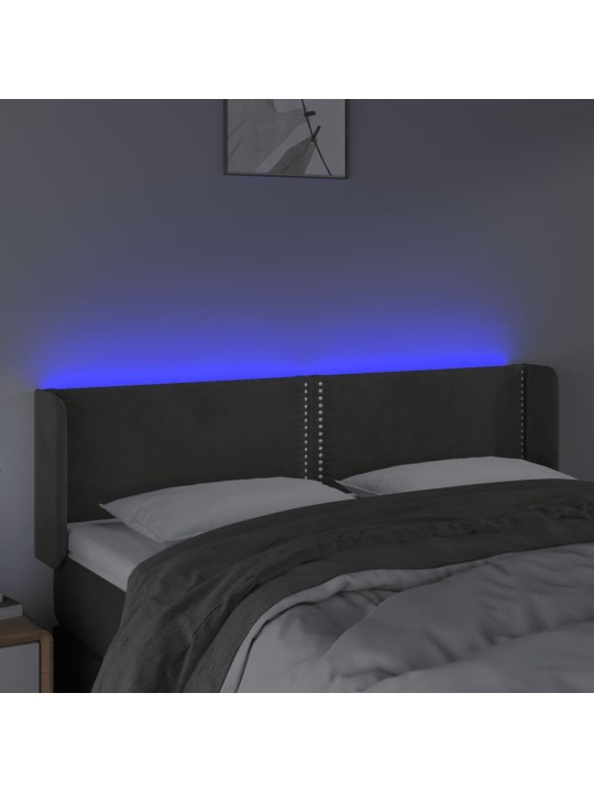 Čelo postele s LED tmavě šedé 147 x 16 x 78/88 cm samet