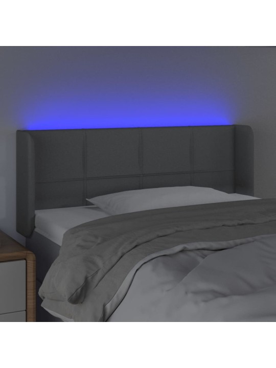 Čelo postele s LED světle šedé 83 x 16 x 78/88 cm textil